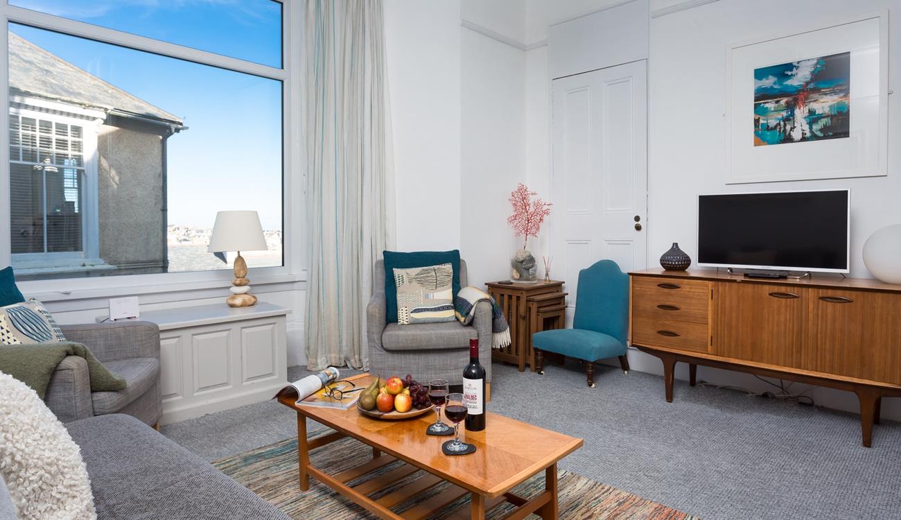 After a day out at the beach or exploring the shops, galleries and eateries in St Ives, snuggle up with a film in the lovely sitting room. 