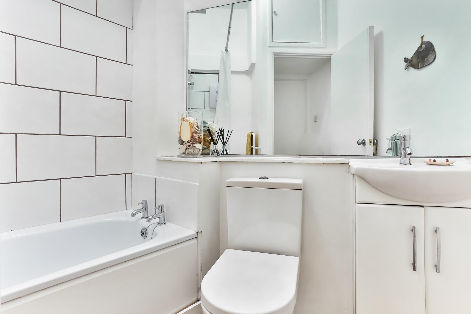 The bathroom is bright and fresh, an ideal space to start your day!