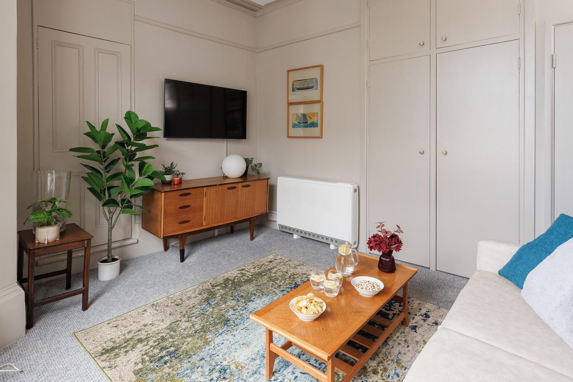 After a day out at the beach or exploring the shops, galleries and eateries in St Ives, snuggle up with a film in the lovely sitting room. 