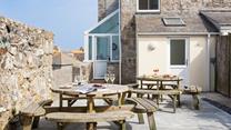 Spend evenings relaxing in the patio area whilst the sun comes down.