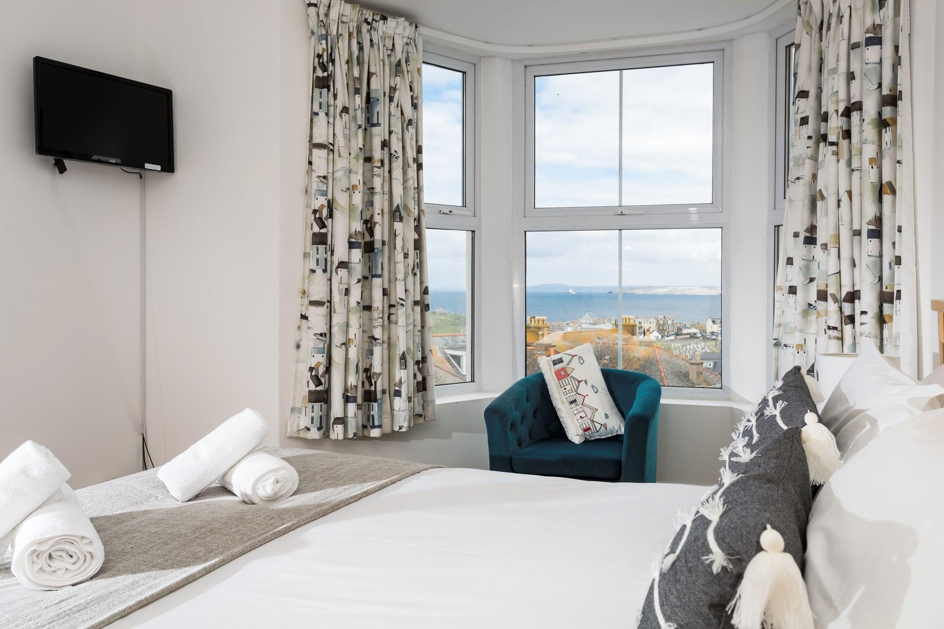 Sink into the spacious double bed and drift off for a dreamy night's sleep.