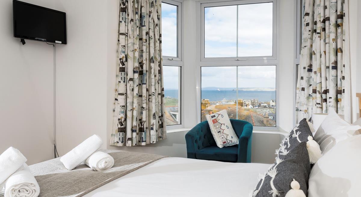 Sink into the spacious double bed and drift off for a dreamy night's sleep.