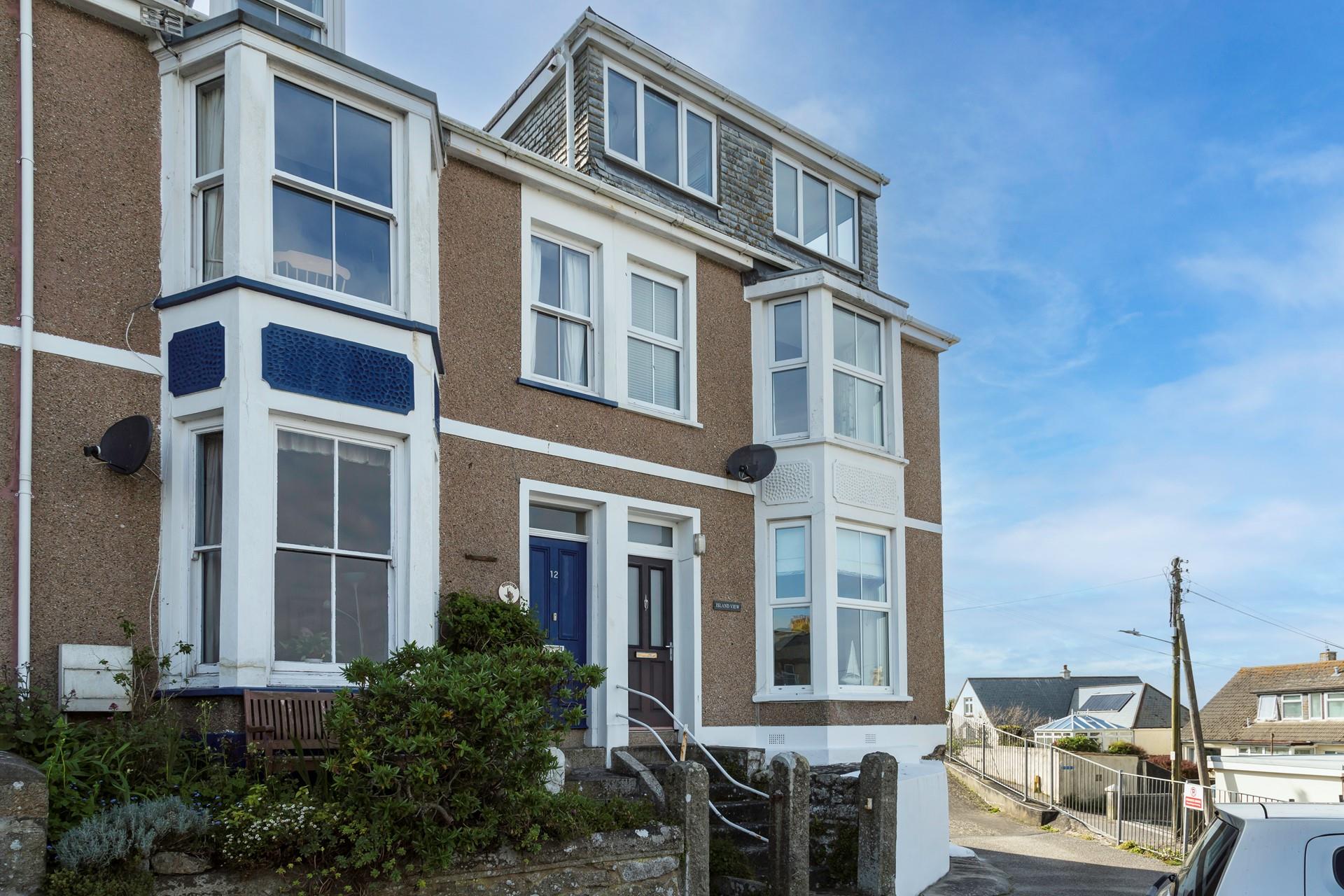 There is parking for up to three cars at this family-friendly property.