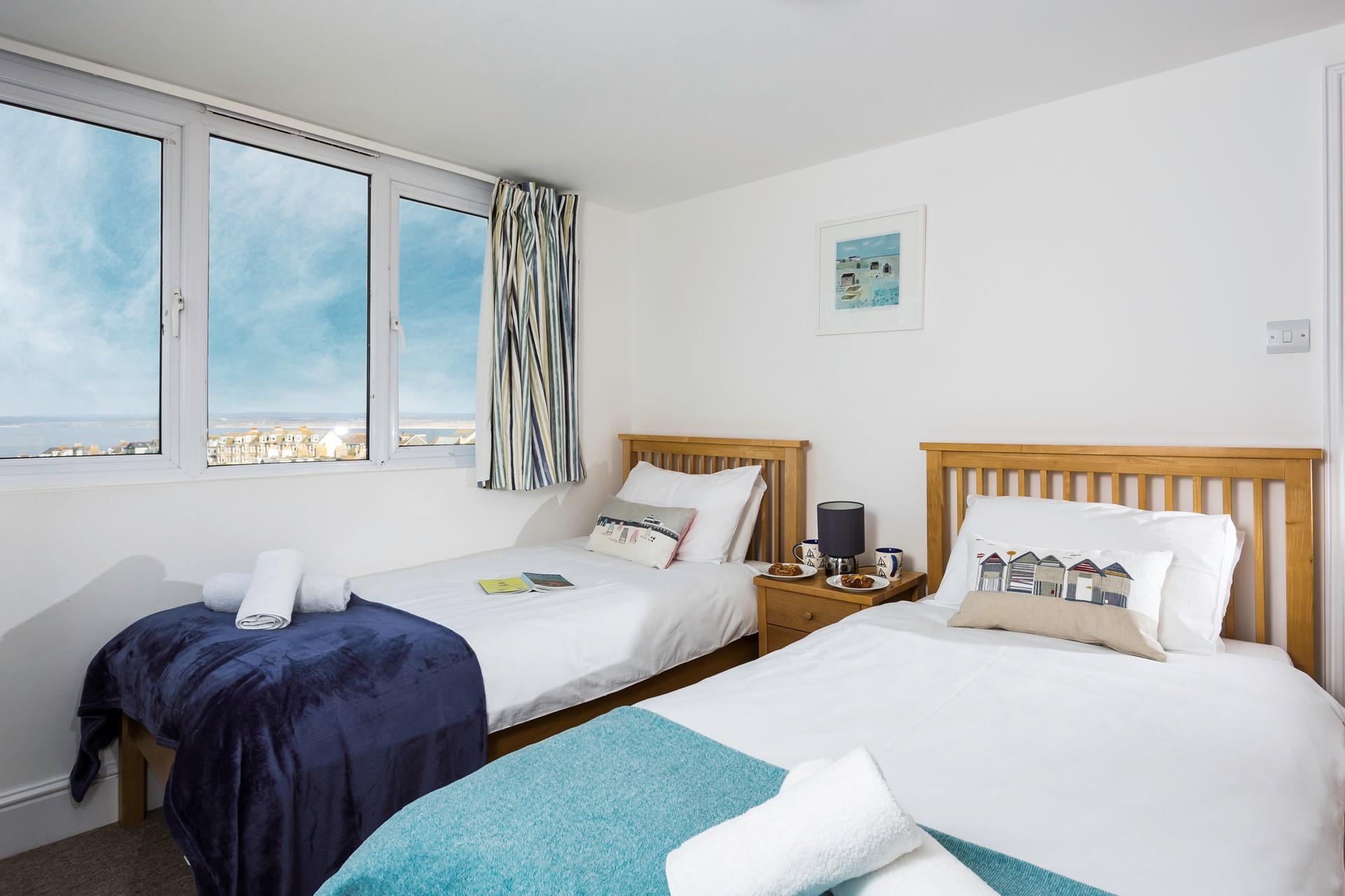 The bedrooms are simply decorated to create a calming sleeping environment.