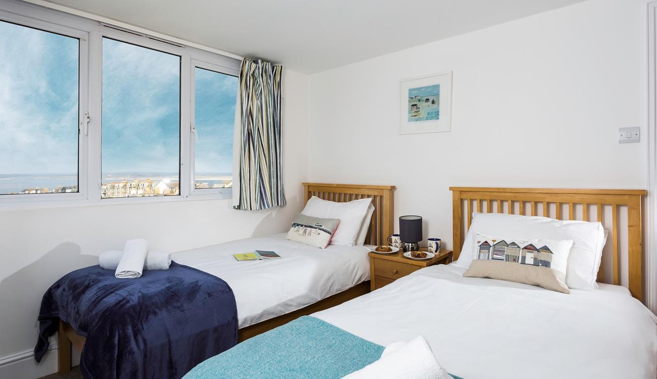 The bedrooms are simply decorated to create a calming sleeping environment.