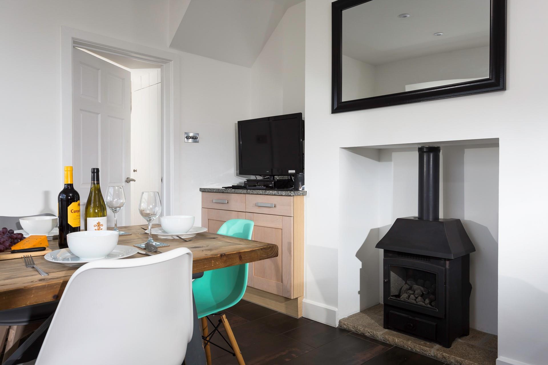 Tuck into a tasty home cooked feast in the dining room.