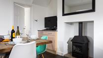 Tuck into a tasty home cooked feast in the dining room.