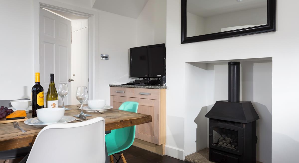 Tuck into a tasty home cooked feast in the dining room.