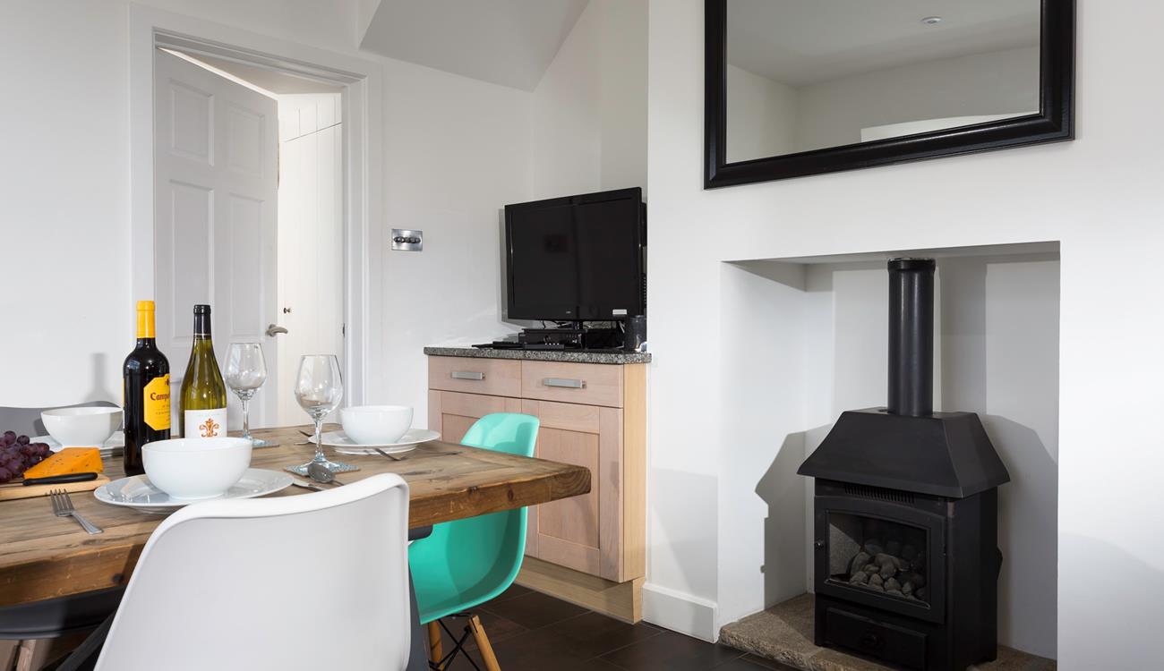 Tuck into a tasty home cooked feast in the dining room.