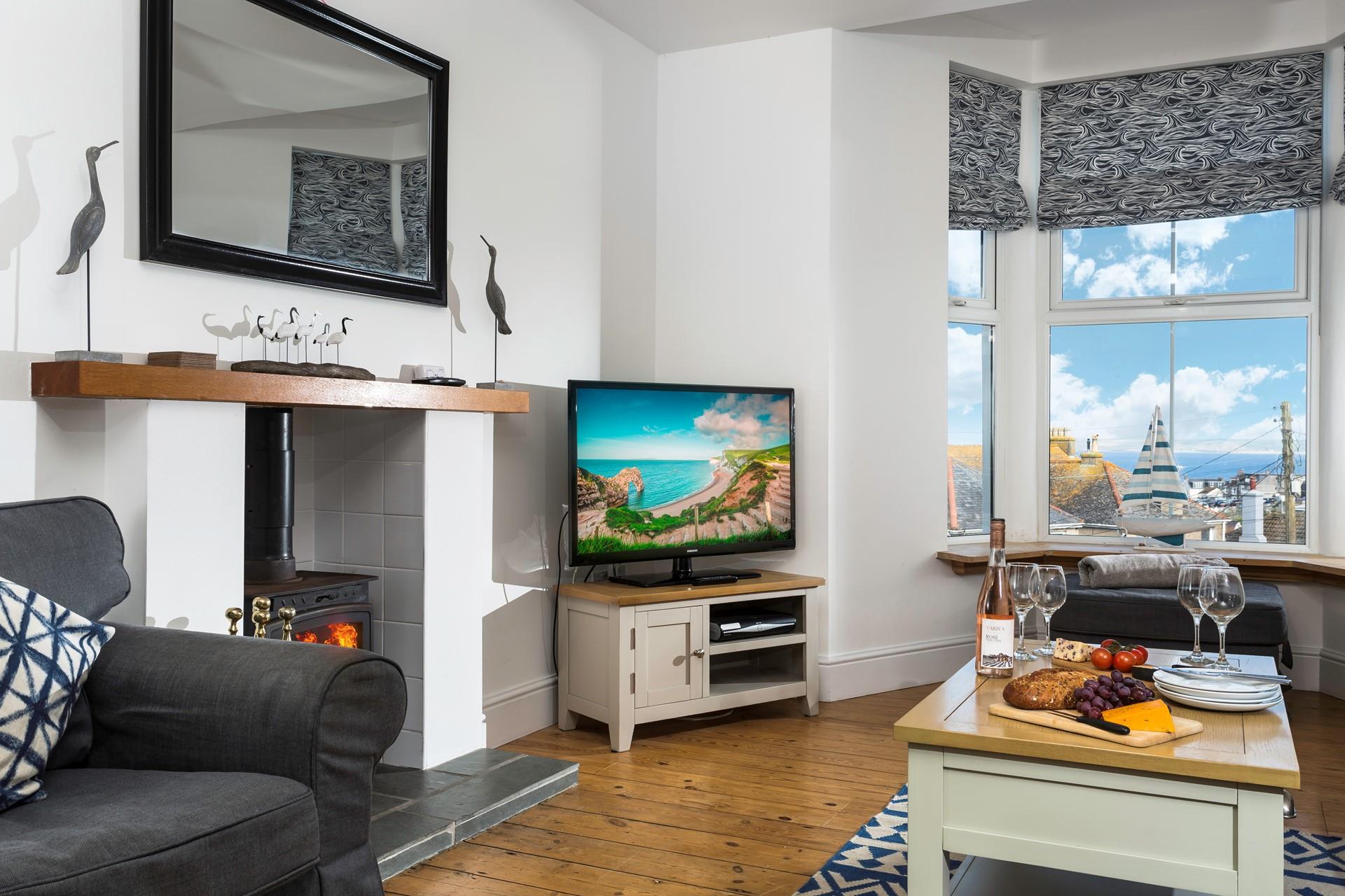 Enjoy the sea views from the comfortable sitting room.