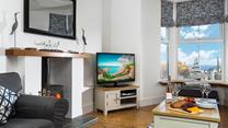 Enjoy the sea views from the comfortable sitting room.