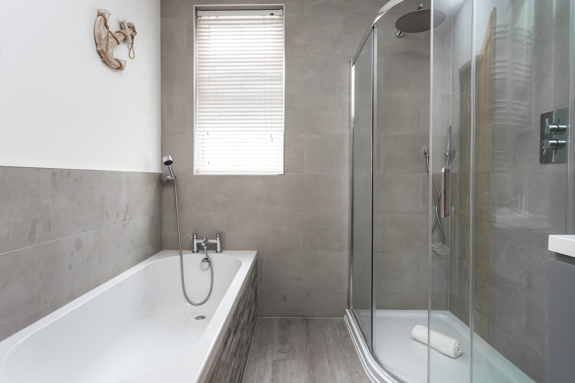 Choose from a shower or a bath to get ready for an evening in town.