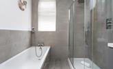 Choose from a shower or a bath to get ready for an evening in town. - Thumbnail Image