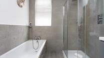 Choose from a shower or a bath to get ready for an evening in town.