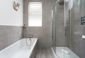 Choose from a shower or a bath to get ready for an evening in town.