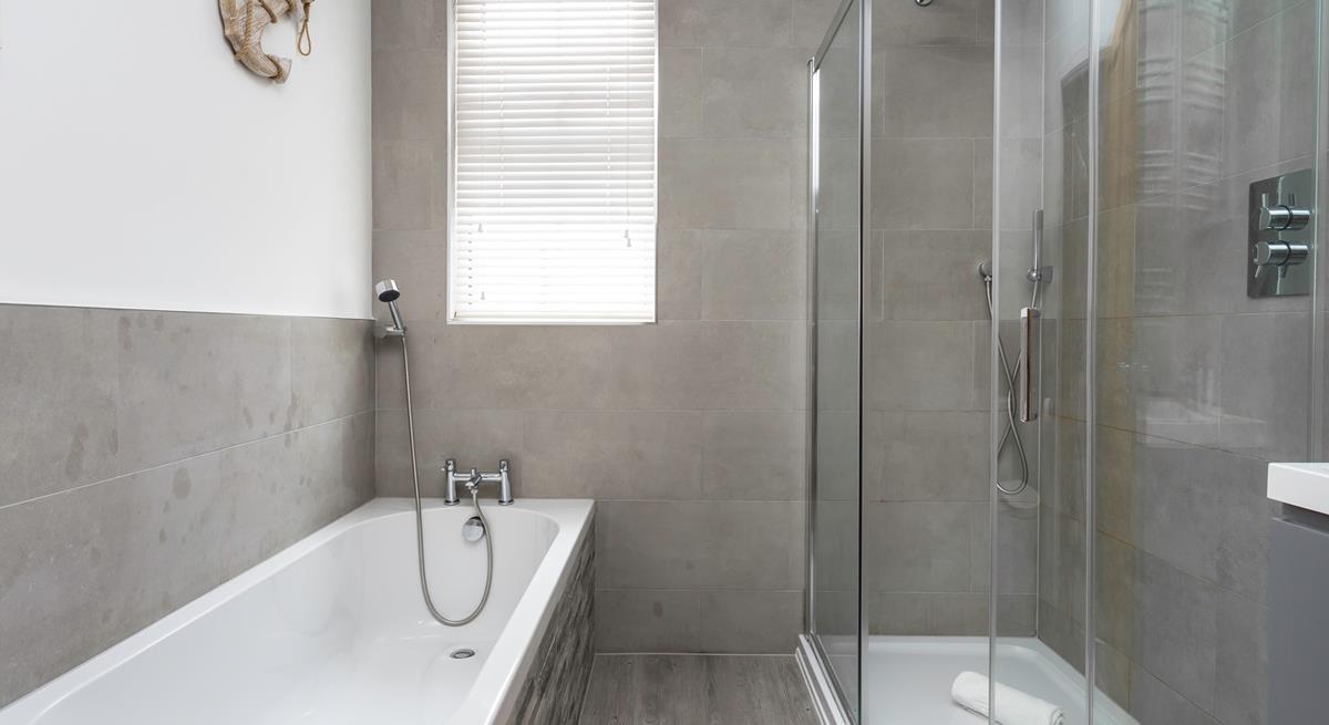 Choose from a shower or a bath to get ready for an evening in town.