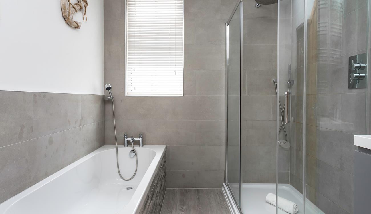 Choose from a shower or a bath to get ready for an evening in town.