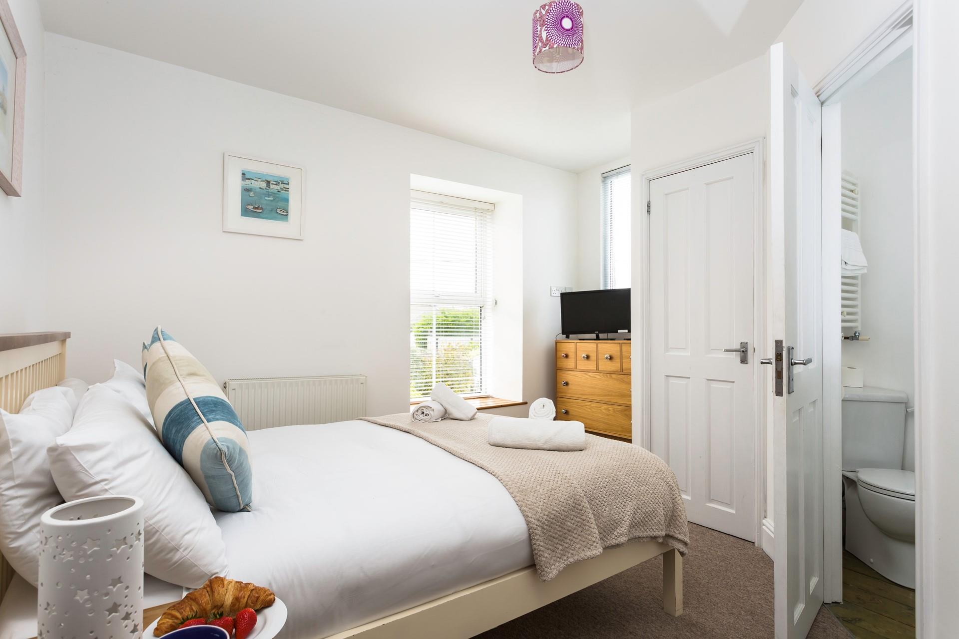 Wake up and wander into the en suite to get ready for the day.