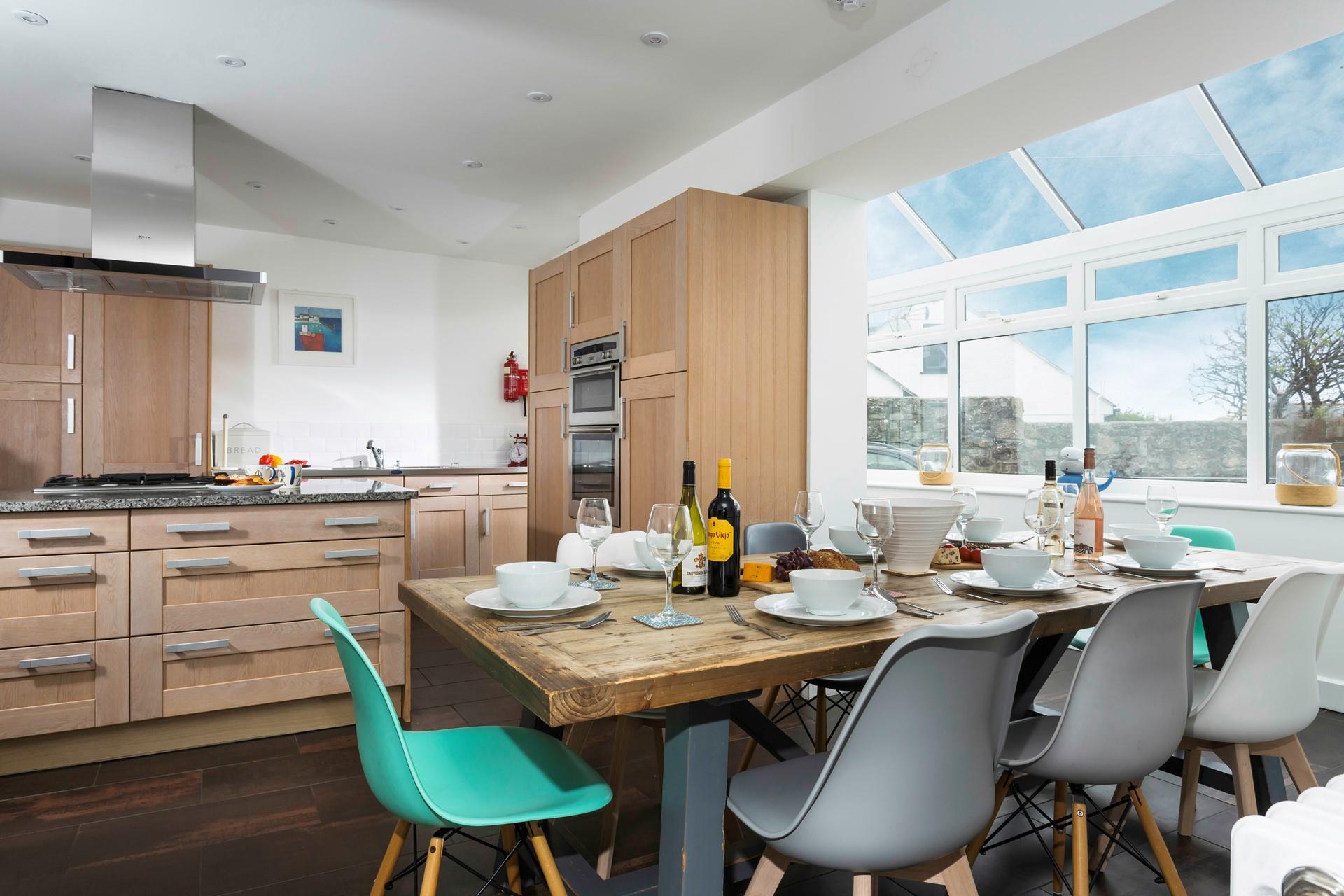 The kitchen/dining area is light and spacious for cooking and dining together.