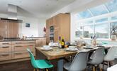 The kitchen/dining area is light and spacious for cooking and dining together. - Thumbnail Image