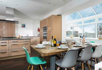 The kitchen/dining area is light and spacious for cooking and dining together.