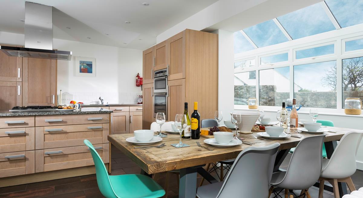 The kitchen/dining area is light and spacious for cooking and dining together.