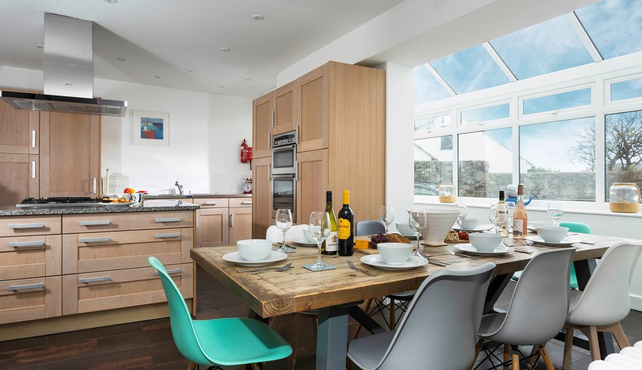 The kitchen/dining area is light and spacious for cooking and dining together.