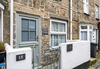 The coloured door and clear signage help make the property a breeze to find.