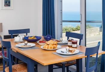 Enjoy a lazy breakfast together while admiring the endless sea views. 