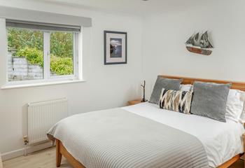 Bedroom 1 is elegantly decorated and provides a peaceful night's sleep.