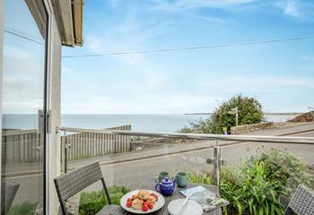 Tuck into a delicious cream tea with a sea view.