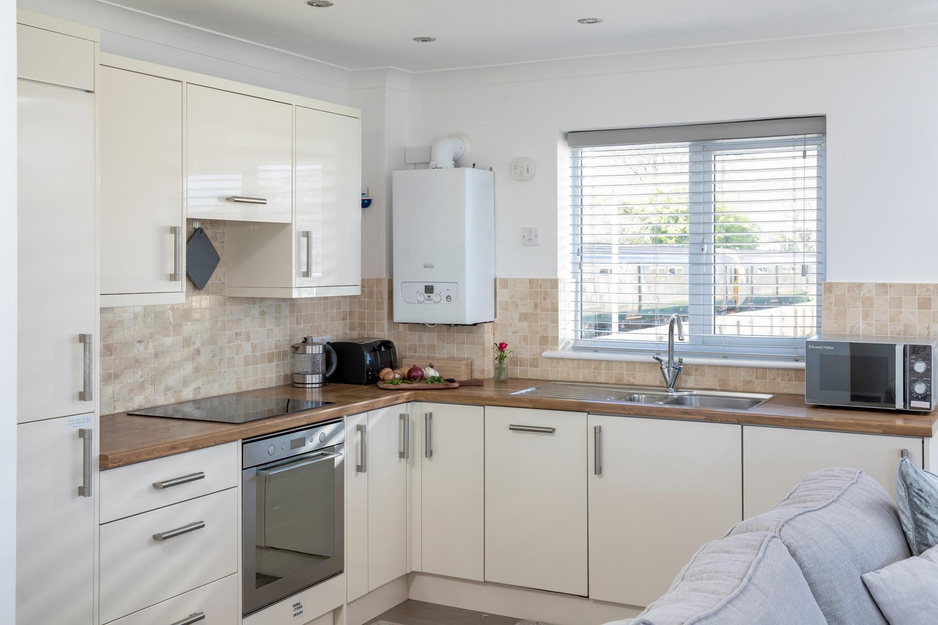 Elegantly finished, the stylish kitchen has all you need for your stay at Lodge 1a, Carrack Gladden.