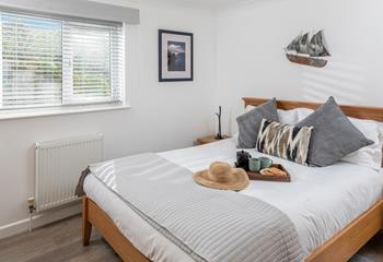 Bedroom 1 is elegantly decorated and provides a peaceful night's sleep.