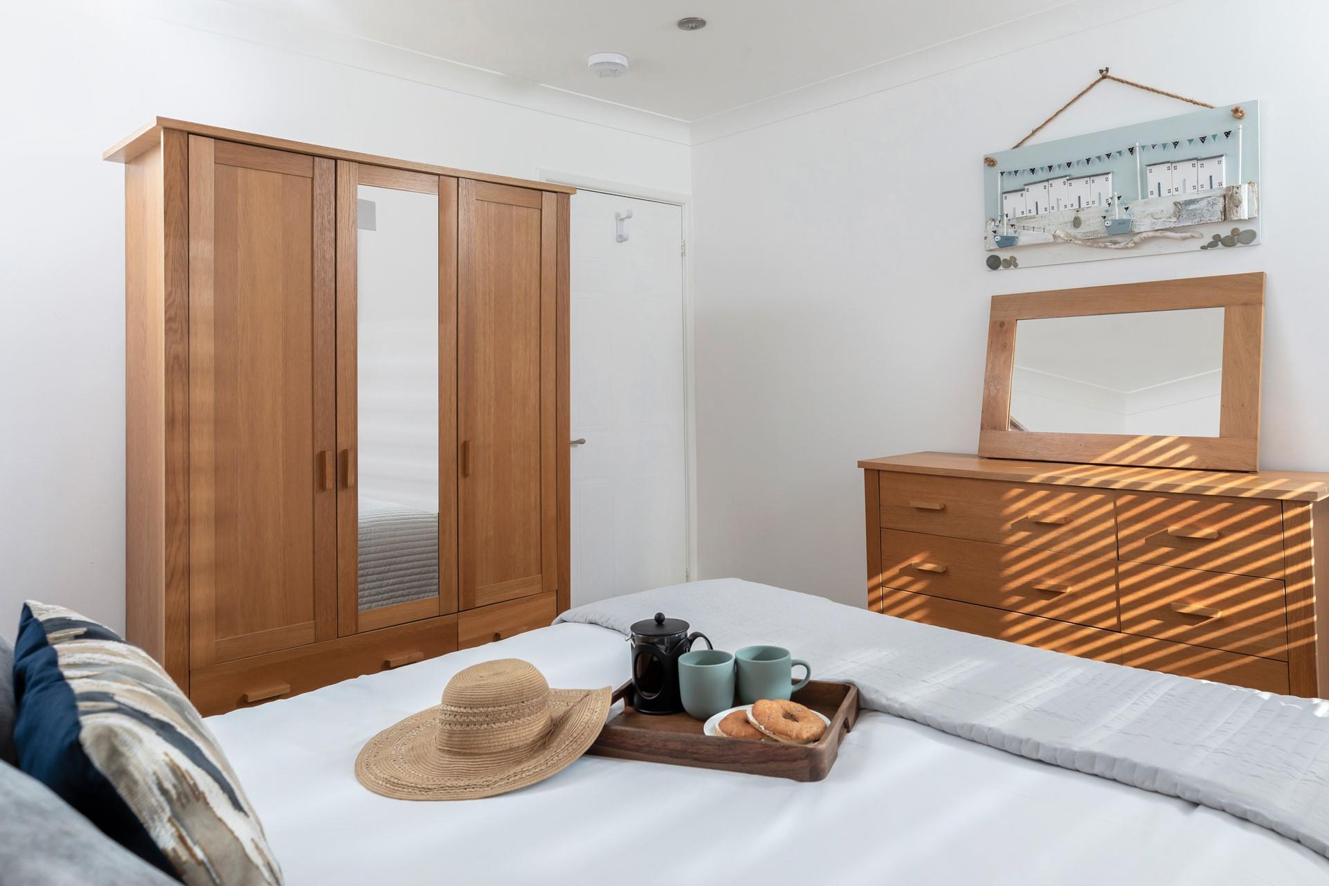 Light and airy with plenty of storage for your holiday wardrobe.