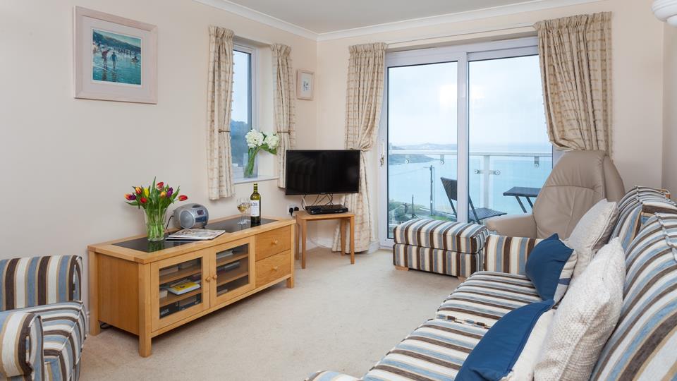 Enjoy far-reaching views across the bay from the comfort of the living area. 
