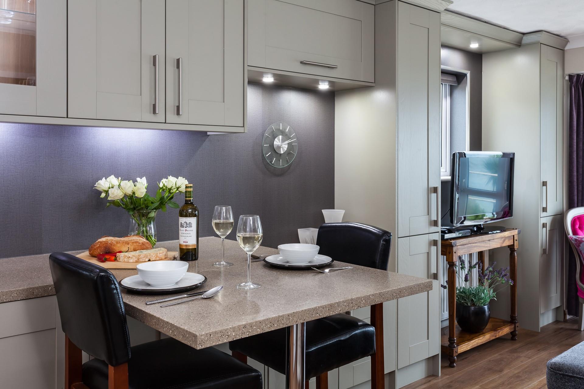 The thoughtfully designed breakfast bar offers a convenient spot to enjoy a meal.