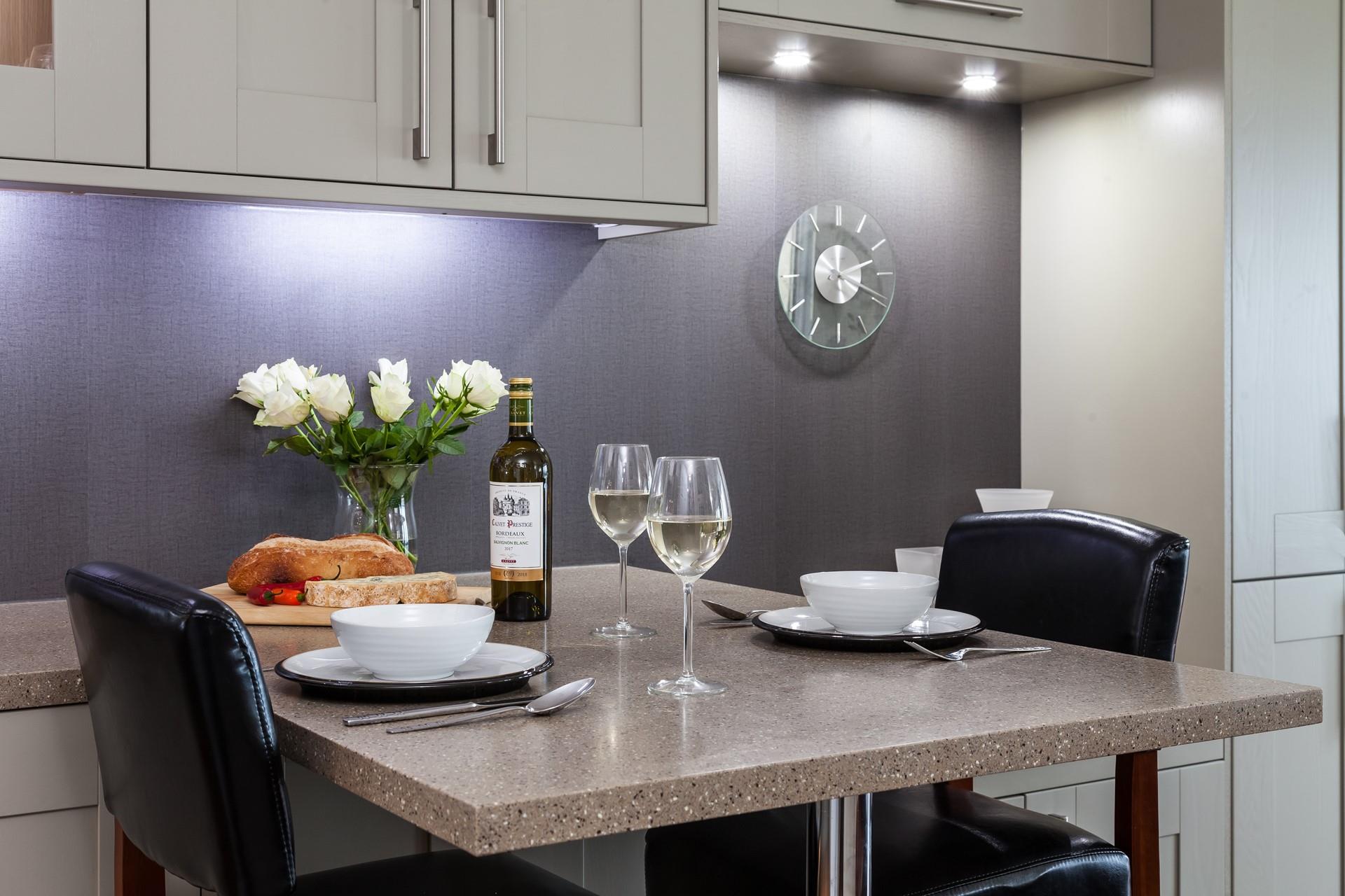 Pour a glass of wine and indulge in some local food. 