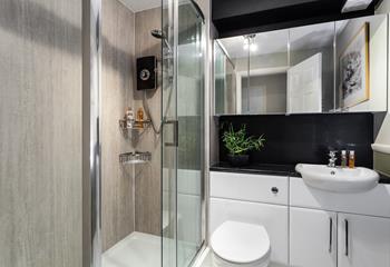 Finished to a high standard, the shower room is modern and stylish.