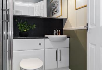 The vanity unit provides plenty of storage for your toiletries in the shower room. 