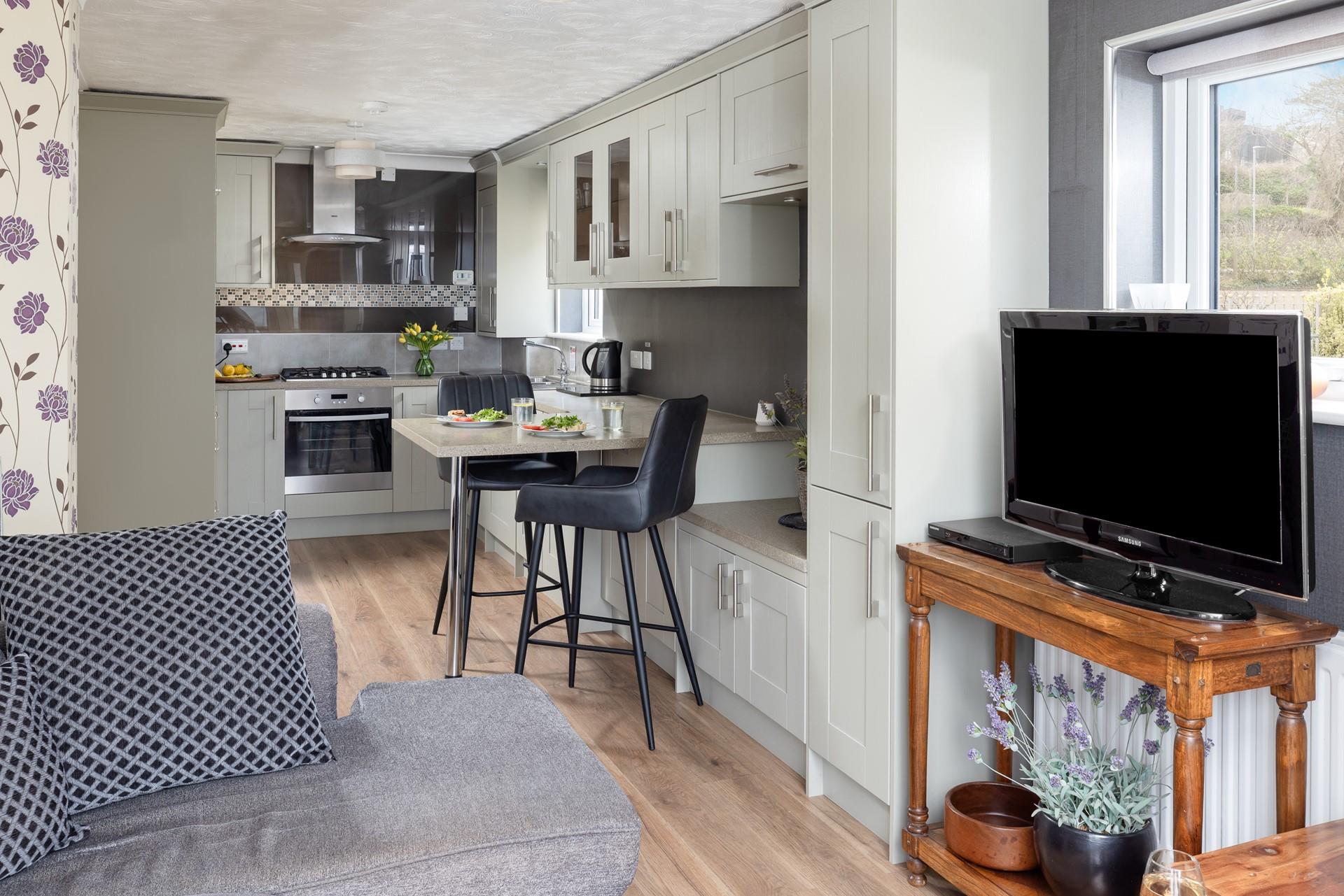 Relax on the sofa after indulging in a delicious meal. 