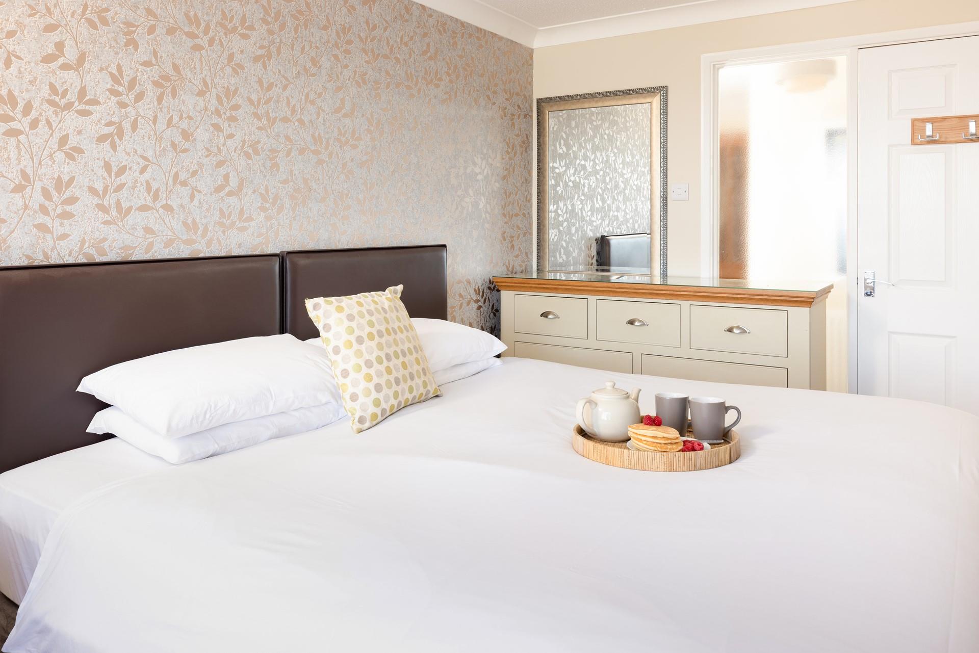 Sink into the super-king bed after a day of exploring. 