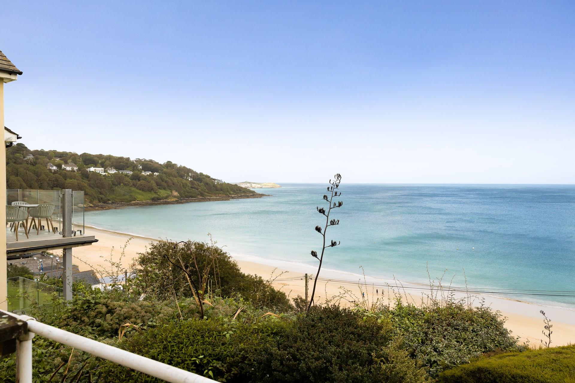 Watch the waves roll in with the town of St Ives in the background. 