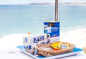 Tuck into tea and Cornish biscuits on the balcony.