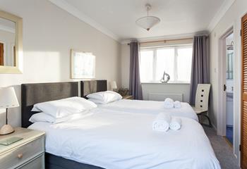 Bright and airy, the twin room is a peaceful place for a restful night's sleep. 