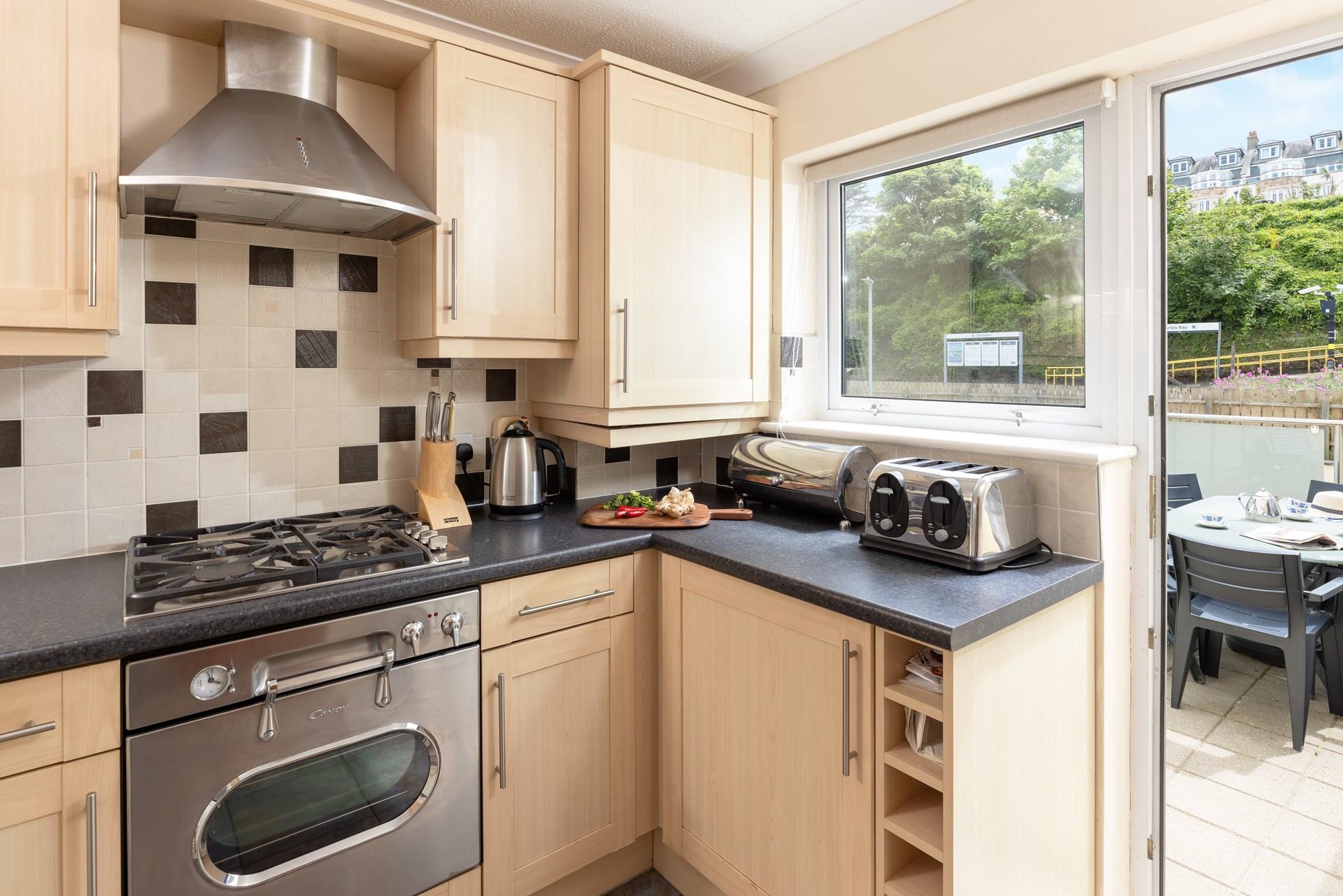 Modern and well-equipped, the kitchen has all you need to cook up a storm.