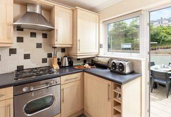 Modern and well-equipped, the kitchen has all you need to cook up a storm.