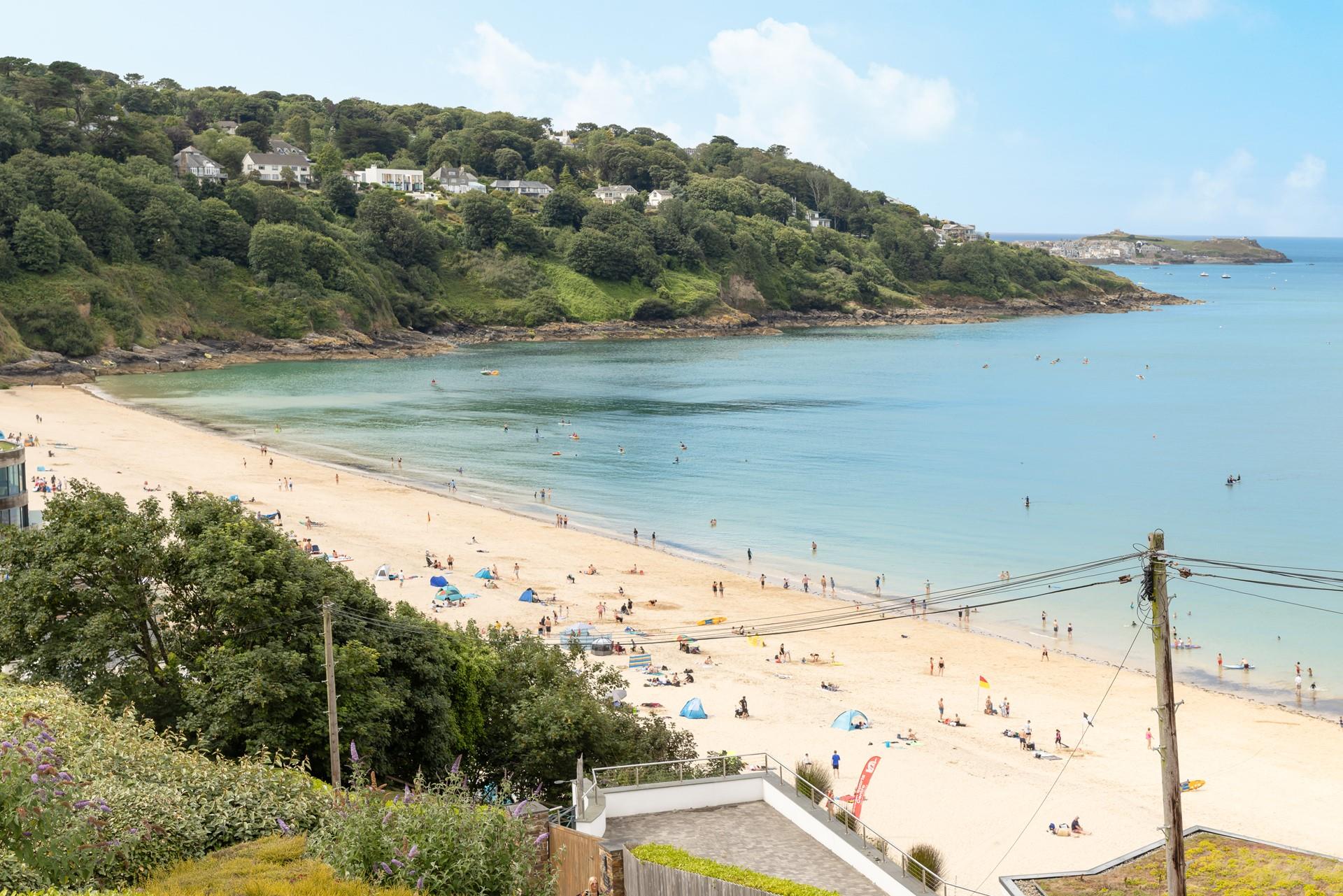 Perched above Carbis Bay beach, Sandy Bay commands breathtaking sea views.