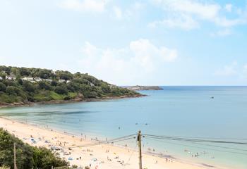 The soft sand and turquoise waters are just moments away!