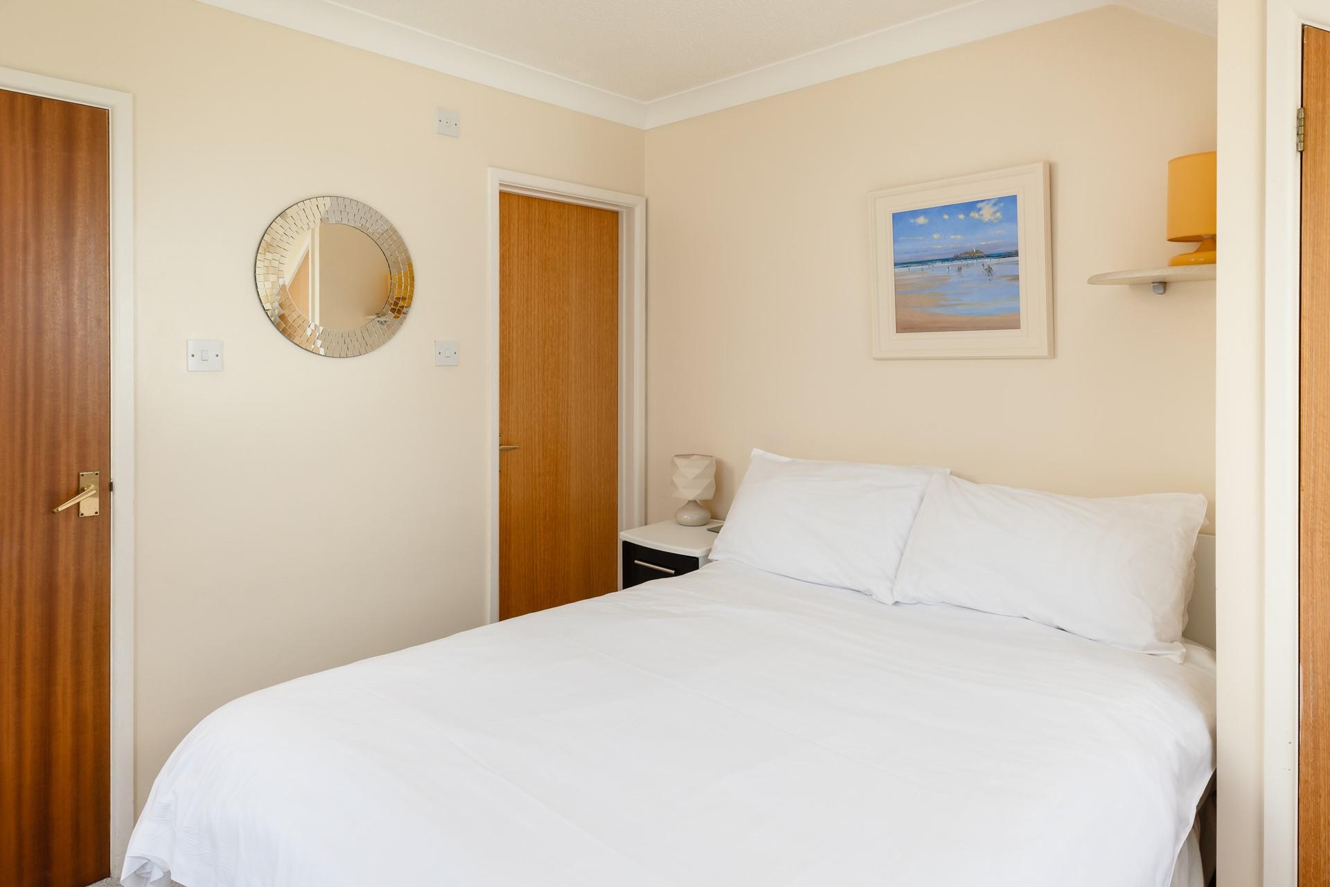 Ocean inspired artwork is dotted throughout the apartment.