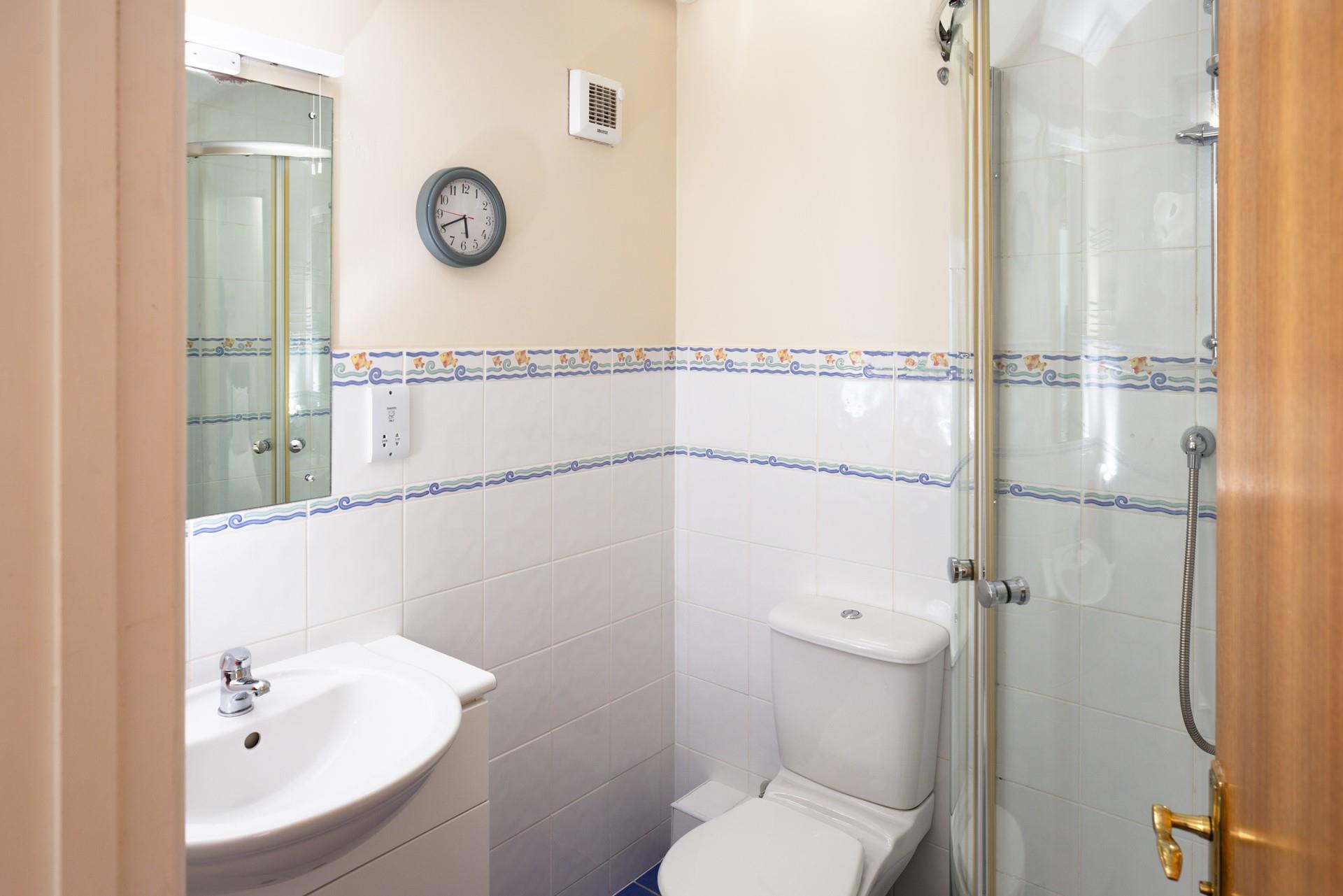 Start your day with an invigorating shower before heading to the beach.